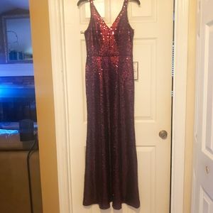 New sequins gown size 8  bodycon style hugs all your curves has some stretch